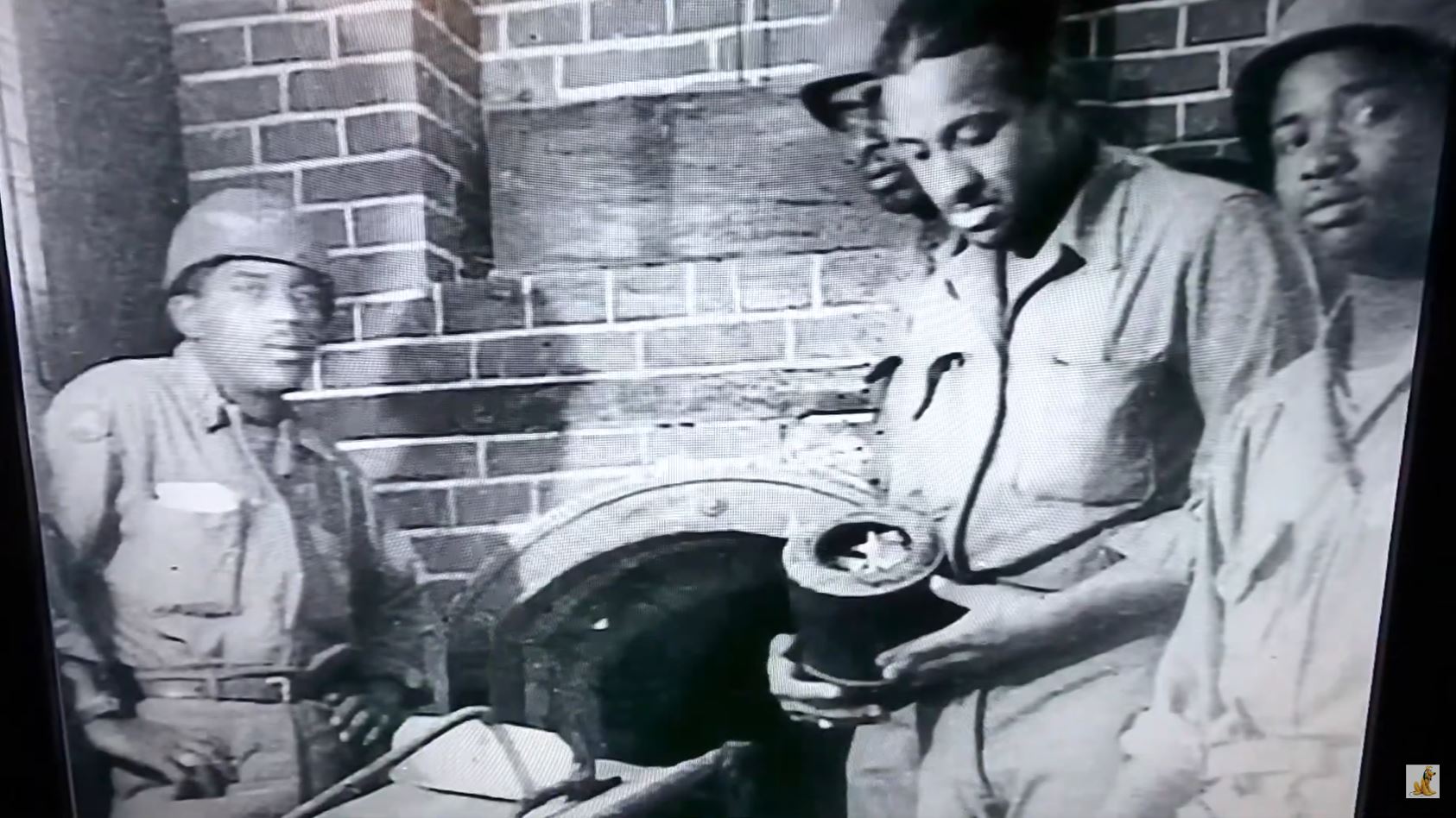 Bros at Mauthausen Ebensee sub camp with urn.JPG